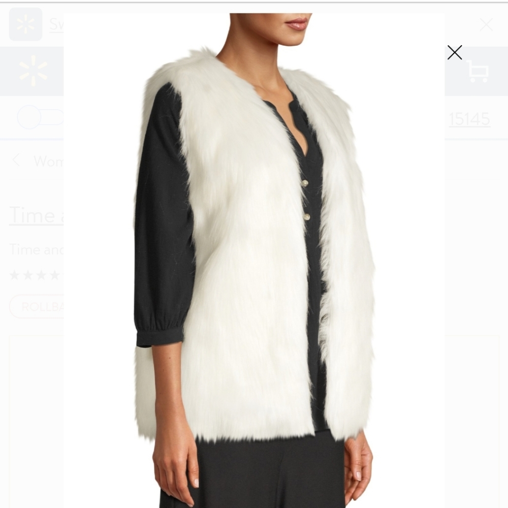 White faux fur vest